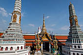 Bangkok Grand Palace, pair of giant yakshas statues the gatekeepers of the entrance of the eastern gallery with two prangs , Temple of the Emerald Buddha (Wat Phra Kaew). 
